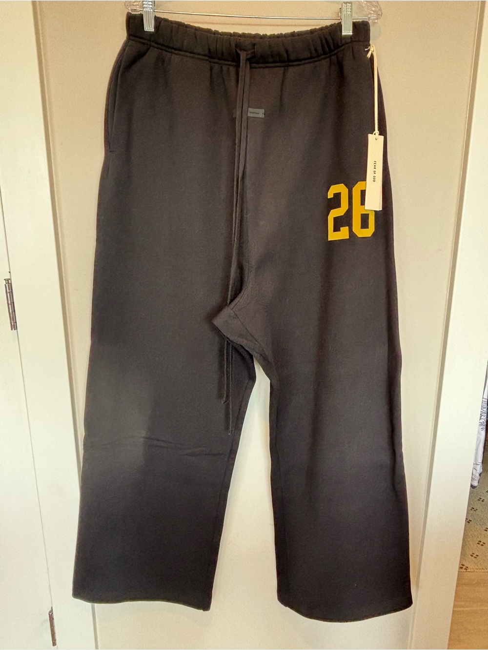 Essentials Men's Black Sweatpants with Yellow '28' Graphic